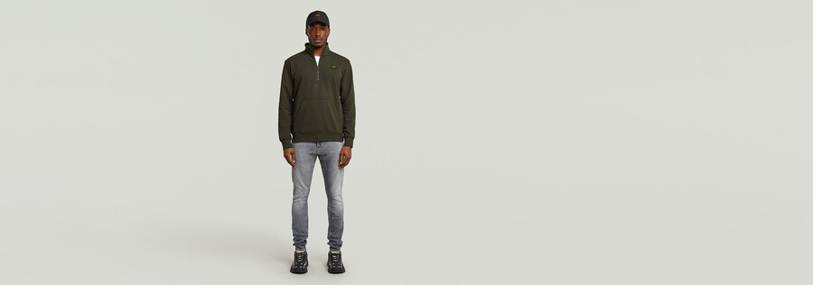 half zip sweater label badge