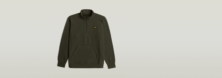 half zip sweater label badge