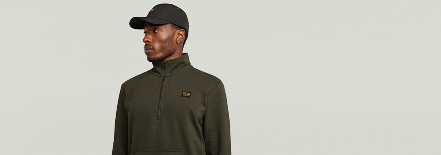 half zip sweater label badge