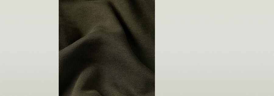 half zip sweater label badge