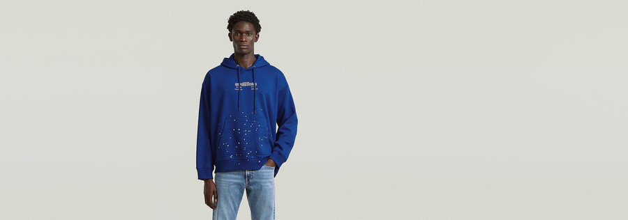 text splatters relaxed hoodie sweater