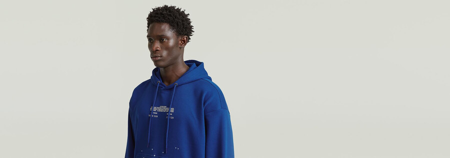 text splatters relaxed hoodie sweater