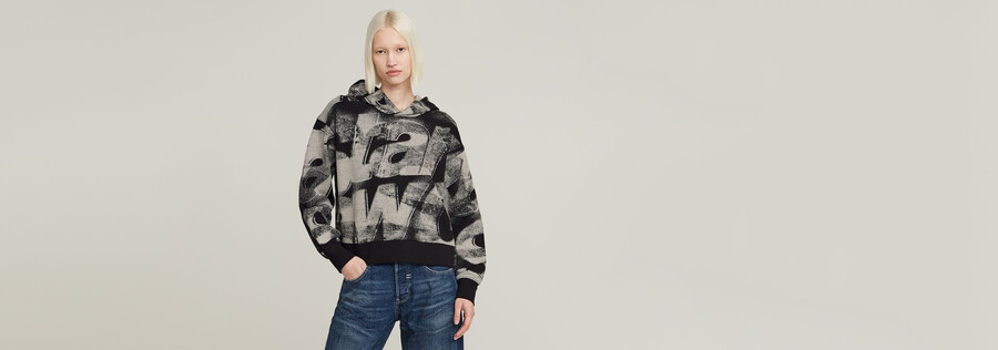 sprayed letters loose hooded sweater